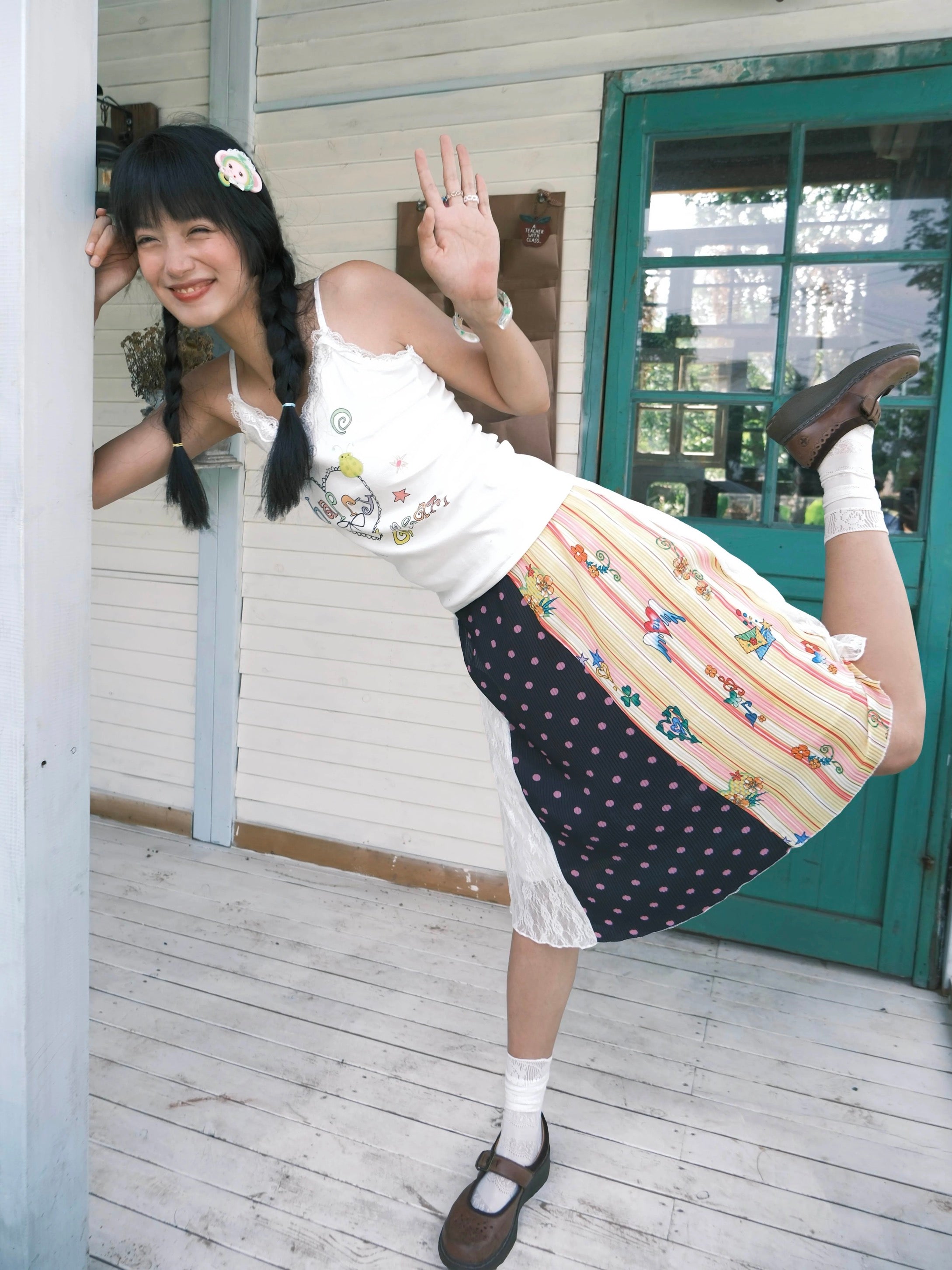 Polka-dot color-block pleated midi skirt