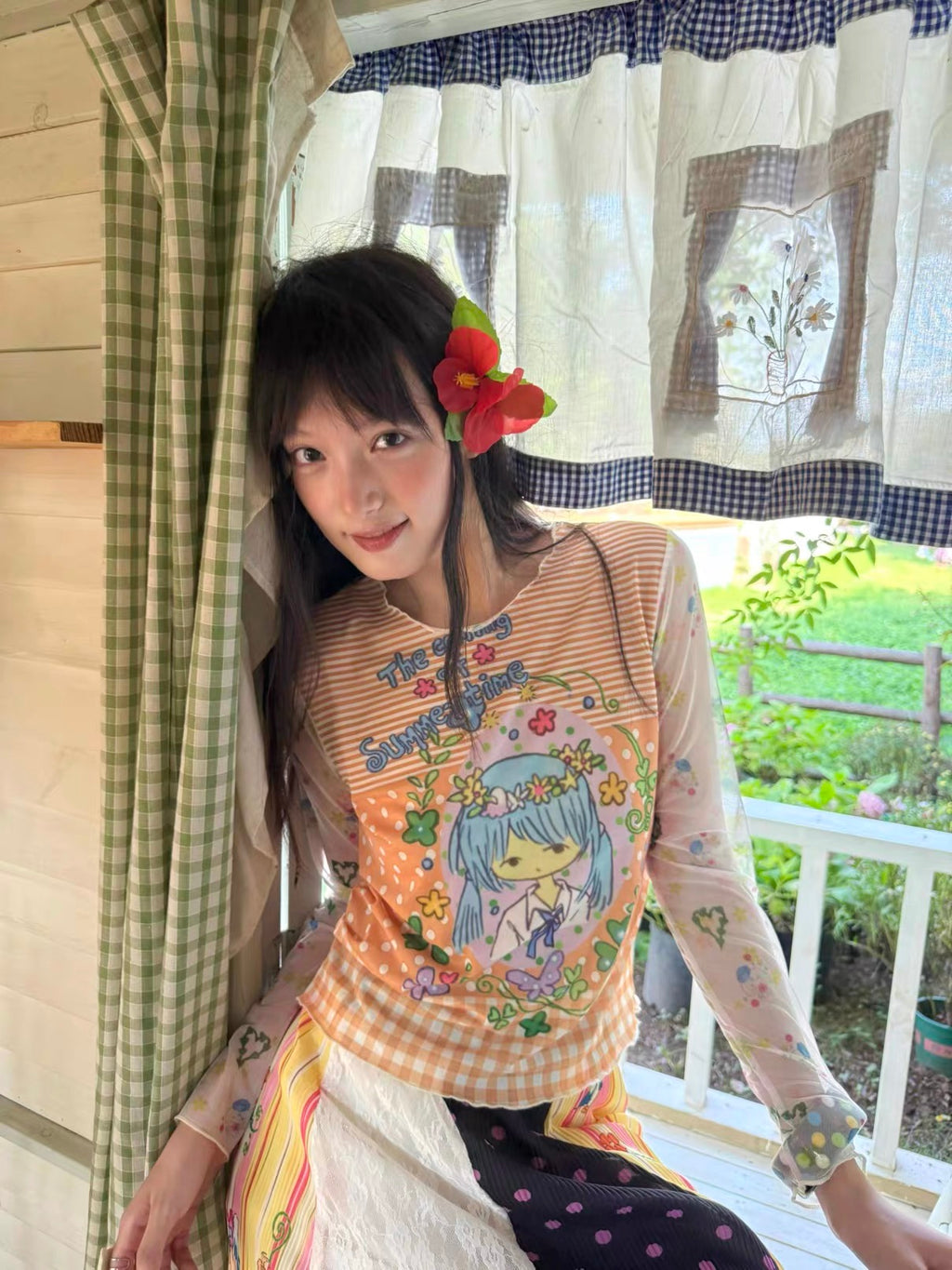 Orange mesh top with a girl print