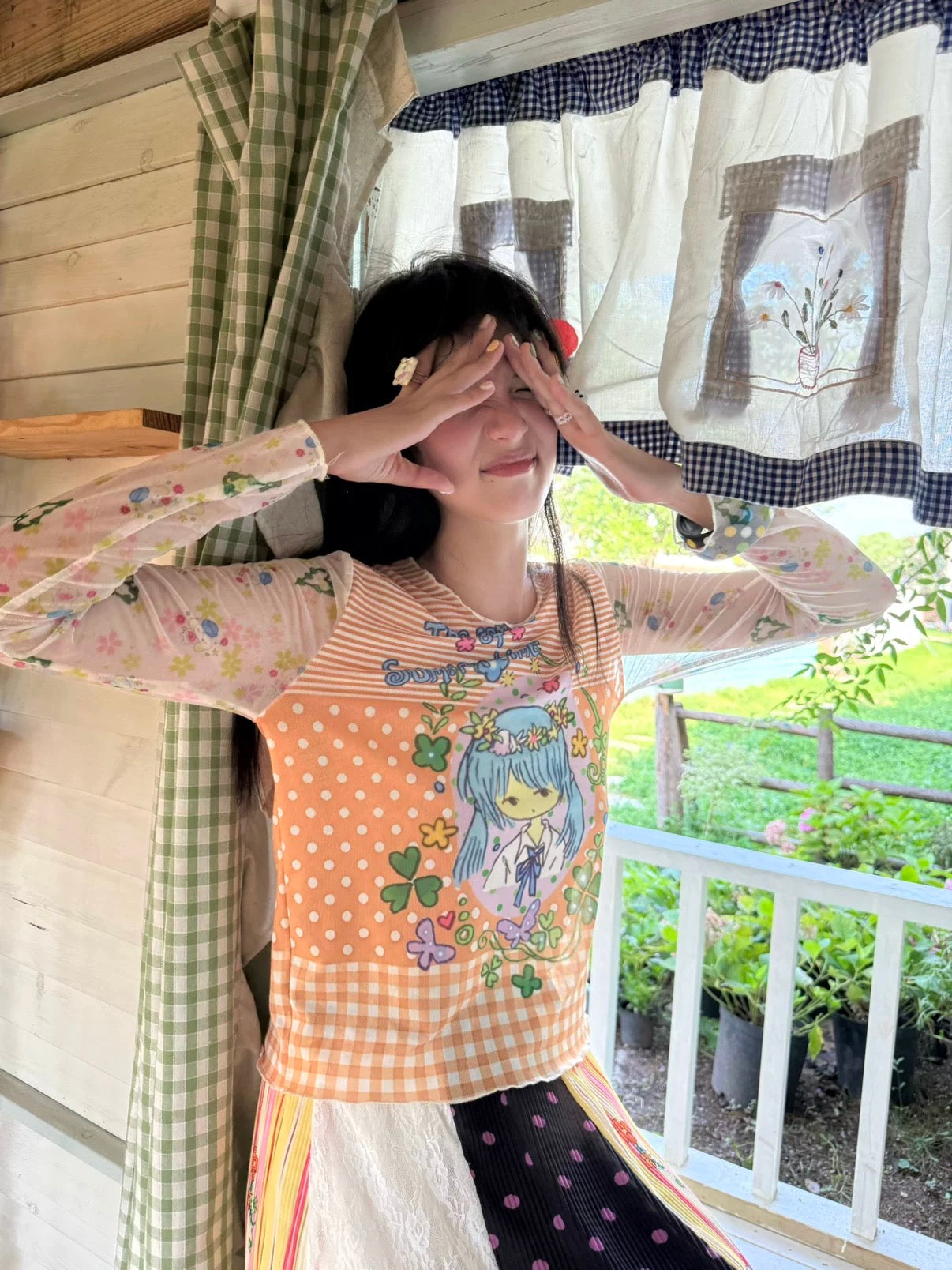 Orange mesh top with a girl print