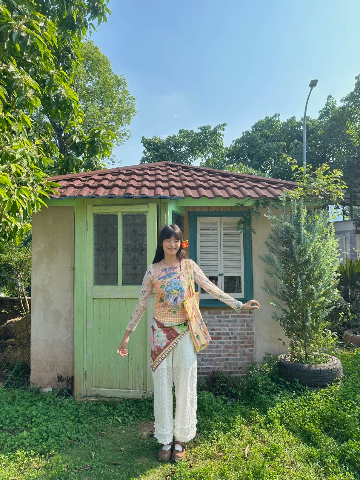Orange mesh top with a girl print