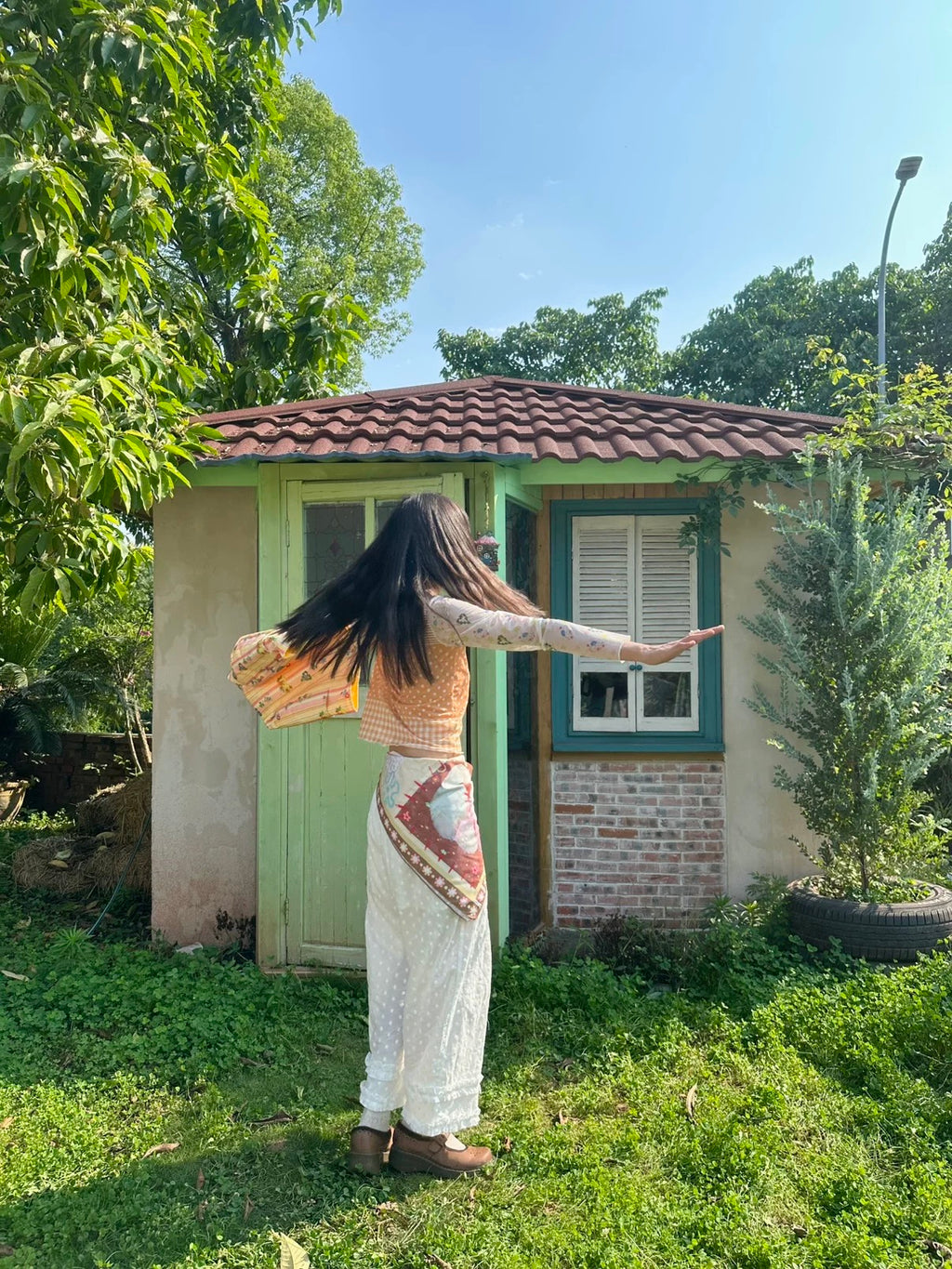 Orange mesh top with a girl print