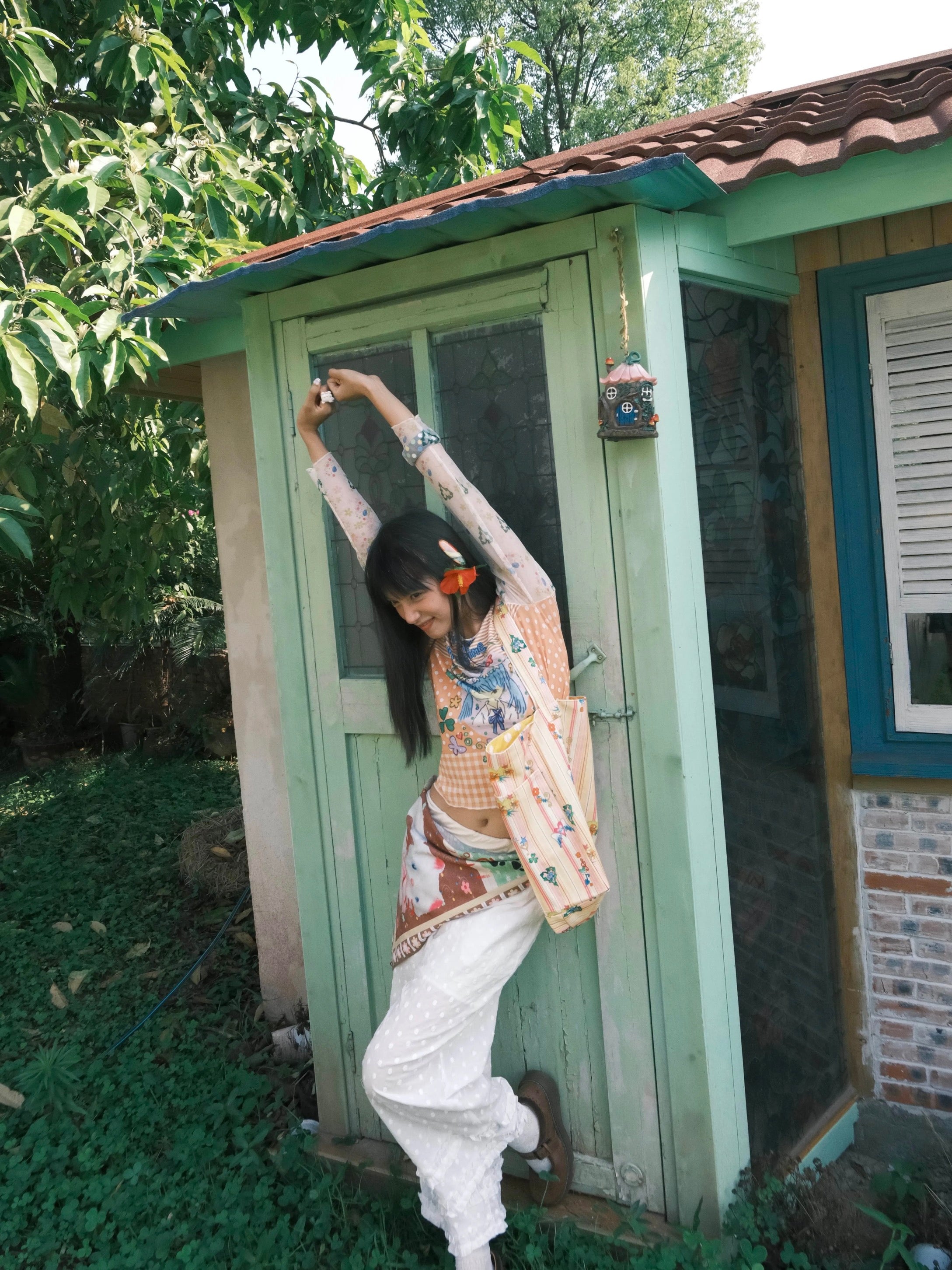 Orange mesh top with a girl print