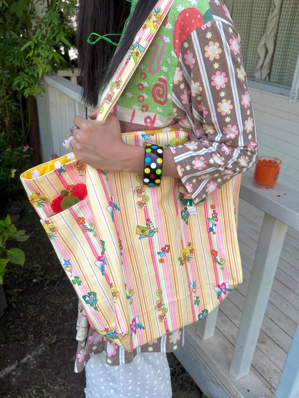 Orange printed canvas shoulder bag