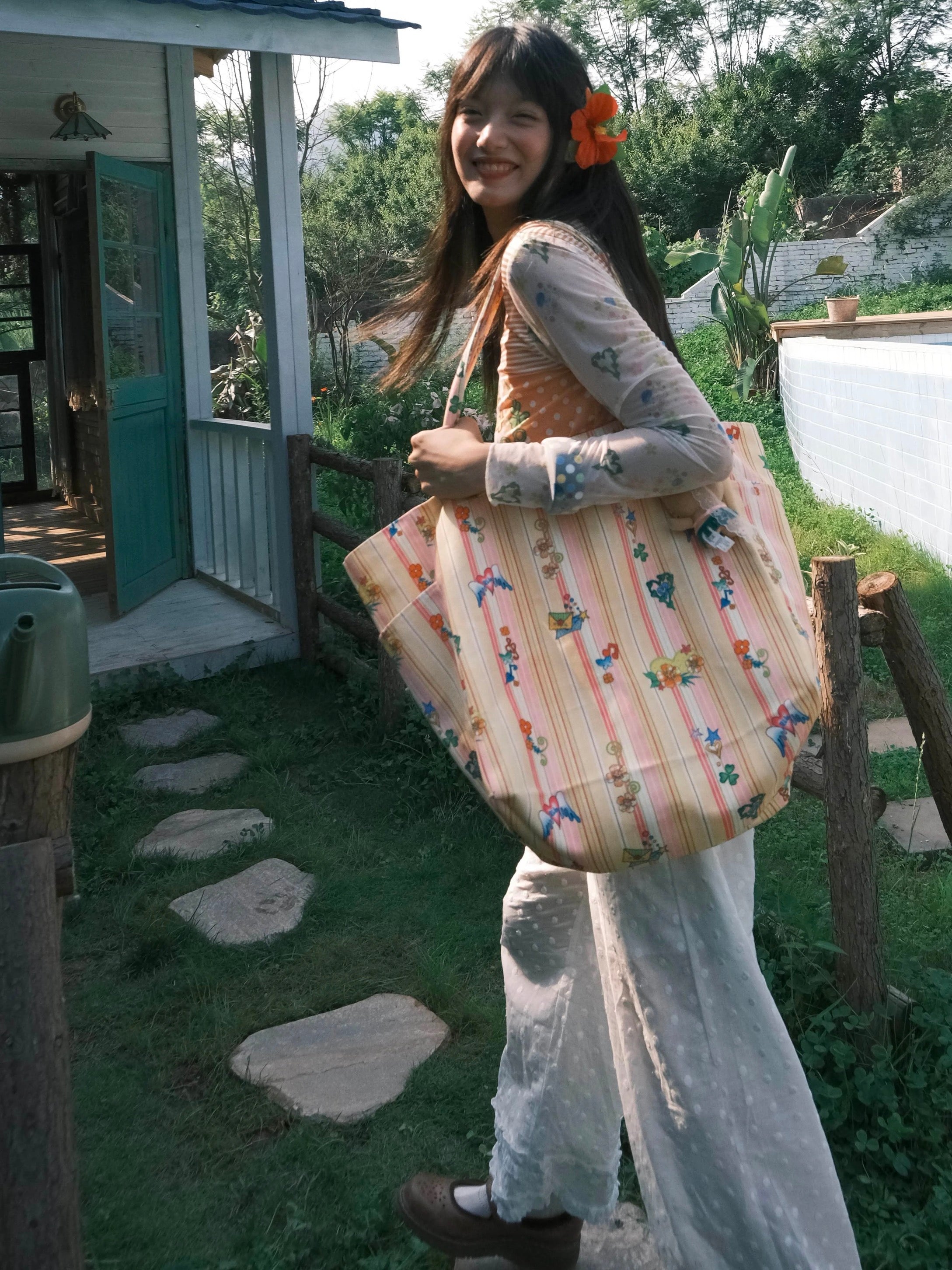 Orange printed canvas shoulder bag