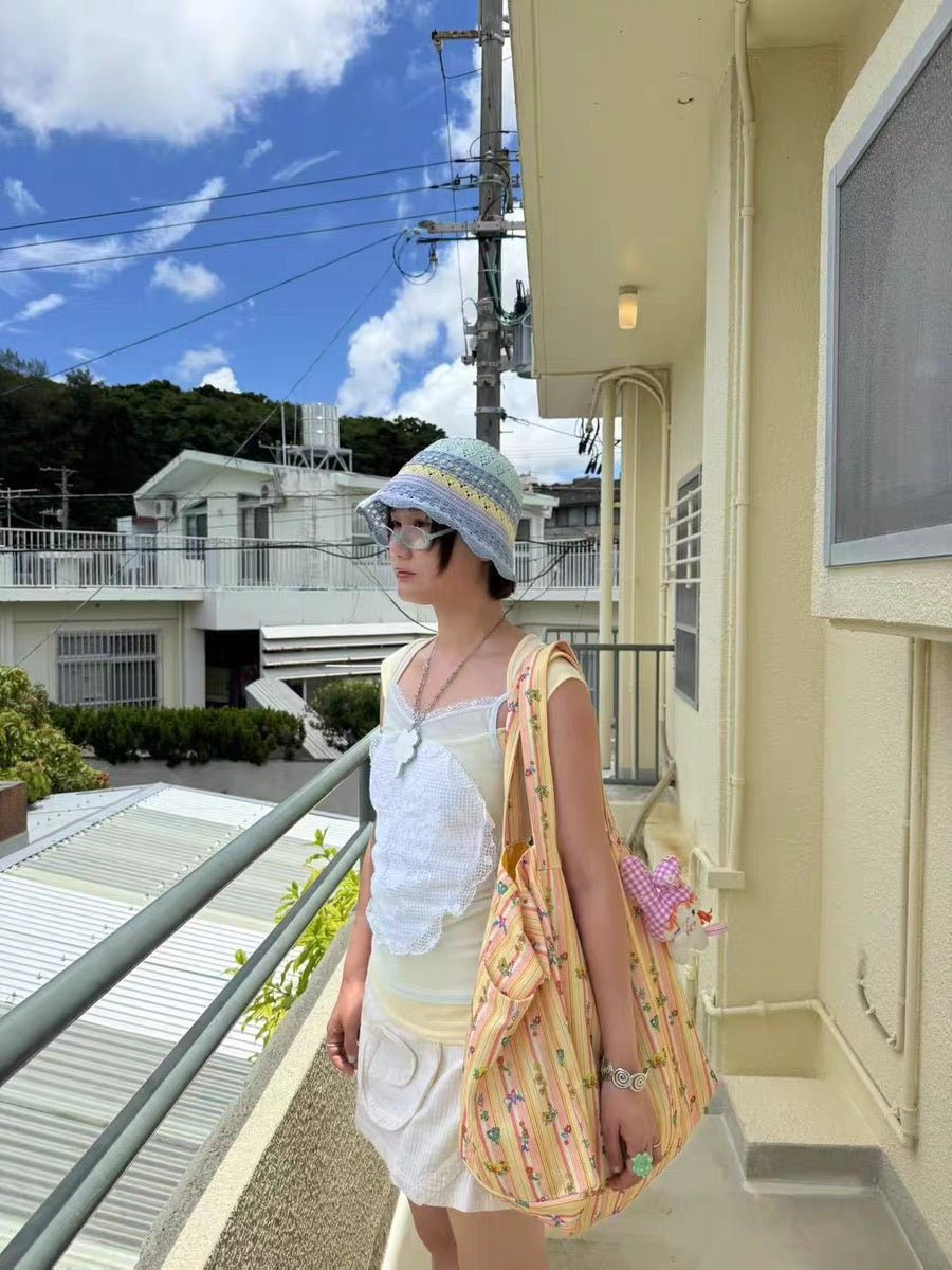 Orange printed canvas shoulder bag