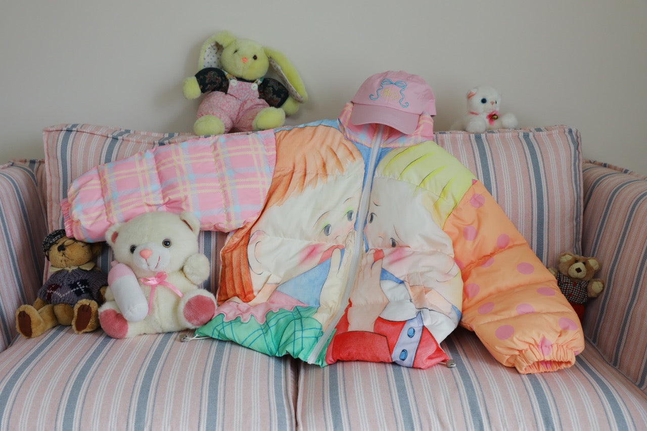 Color-block down jacket with a girl illustration