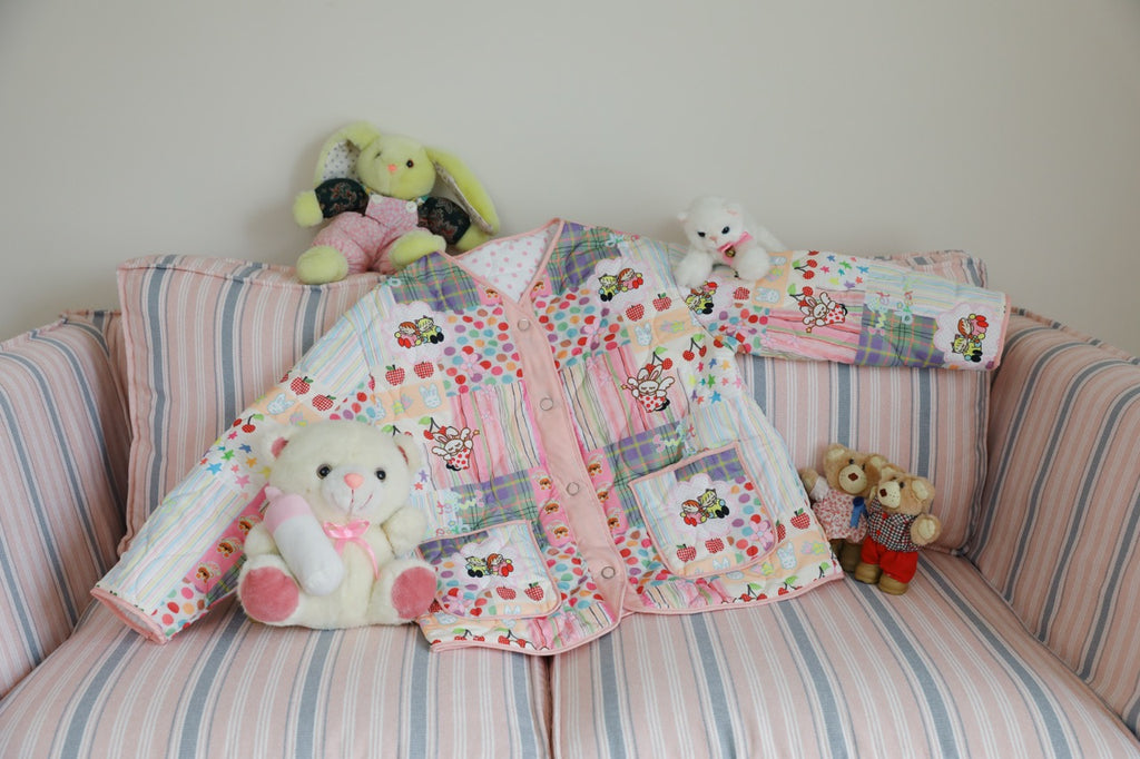 Quilted cotton coat with illustrated print