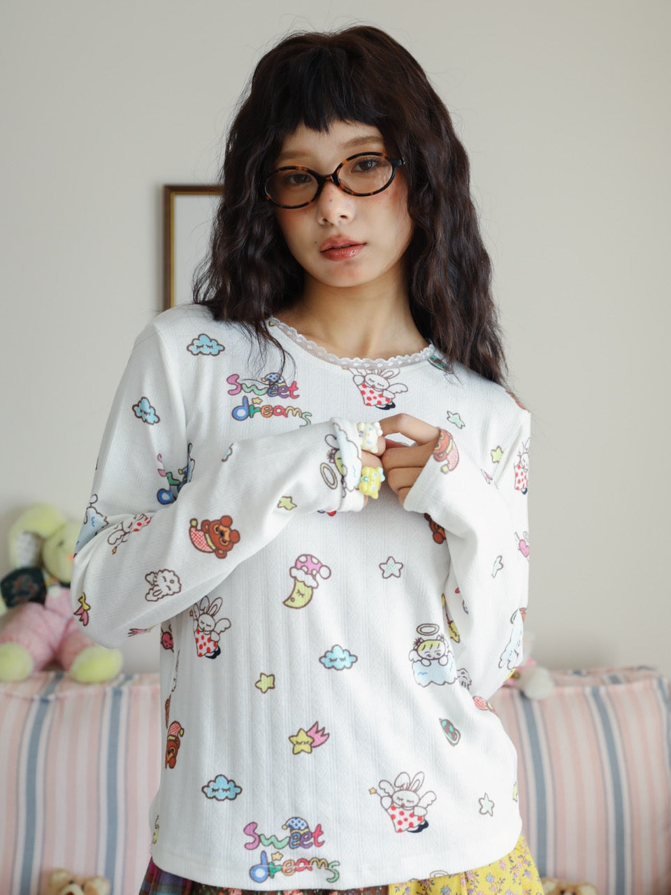 White base layer top with all-over print and lace trim