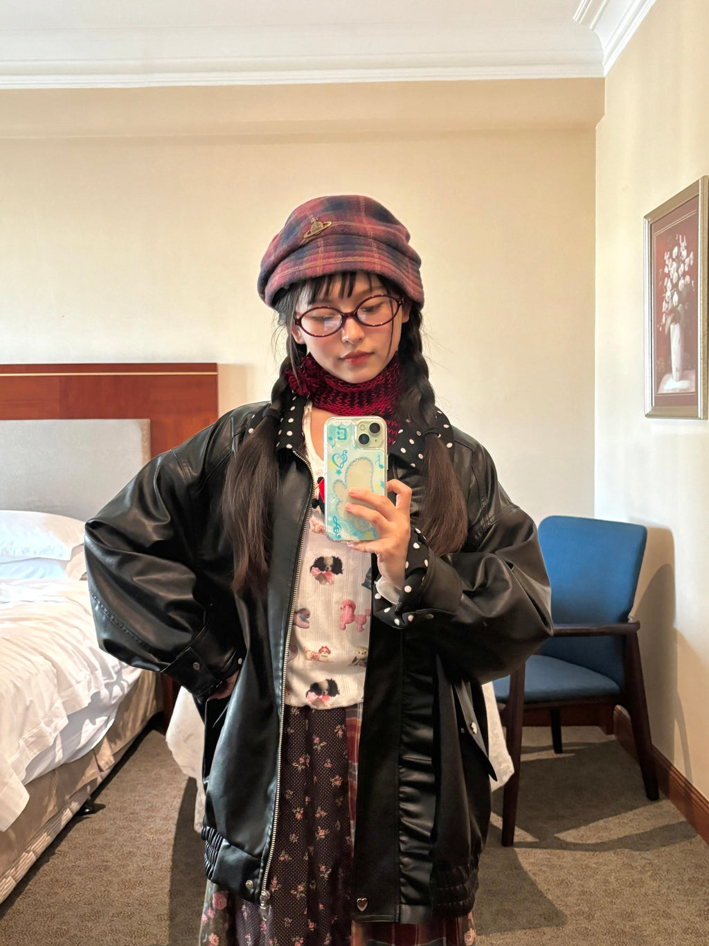 Black leather jacket with polka-dot collar and lace trim