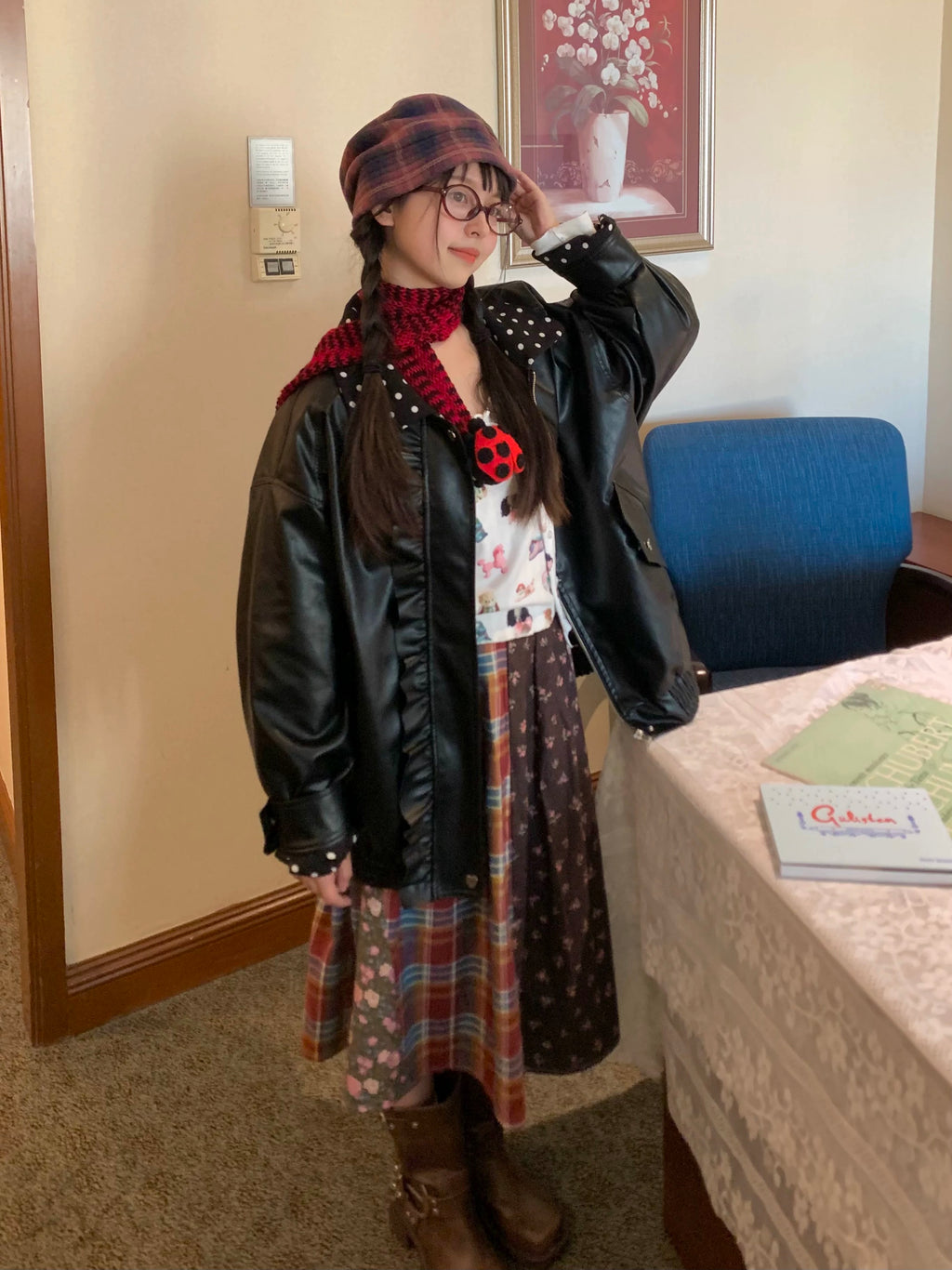 Black leather jacket with polka-dot collar and lace trim